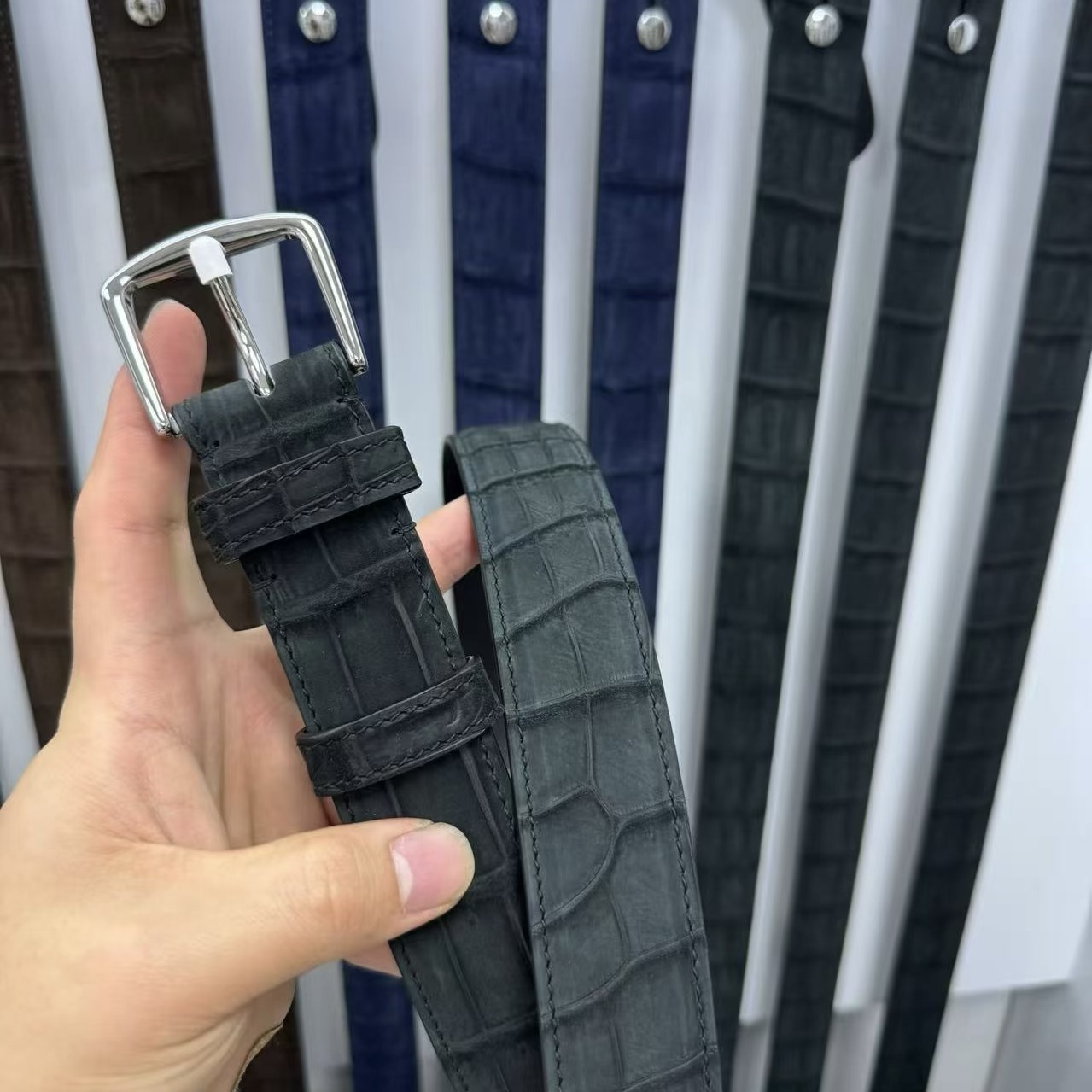 Black crocodile-embossed leather belt with silver pin buckle