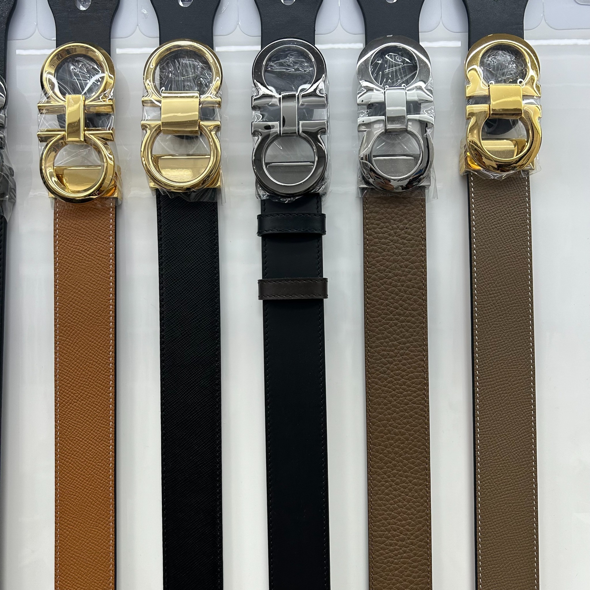 Leather belt collection with silver double-ring buckles