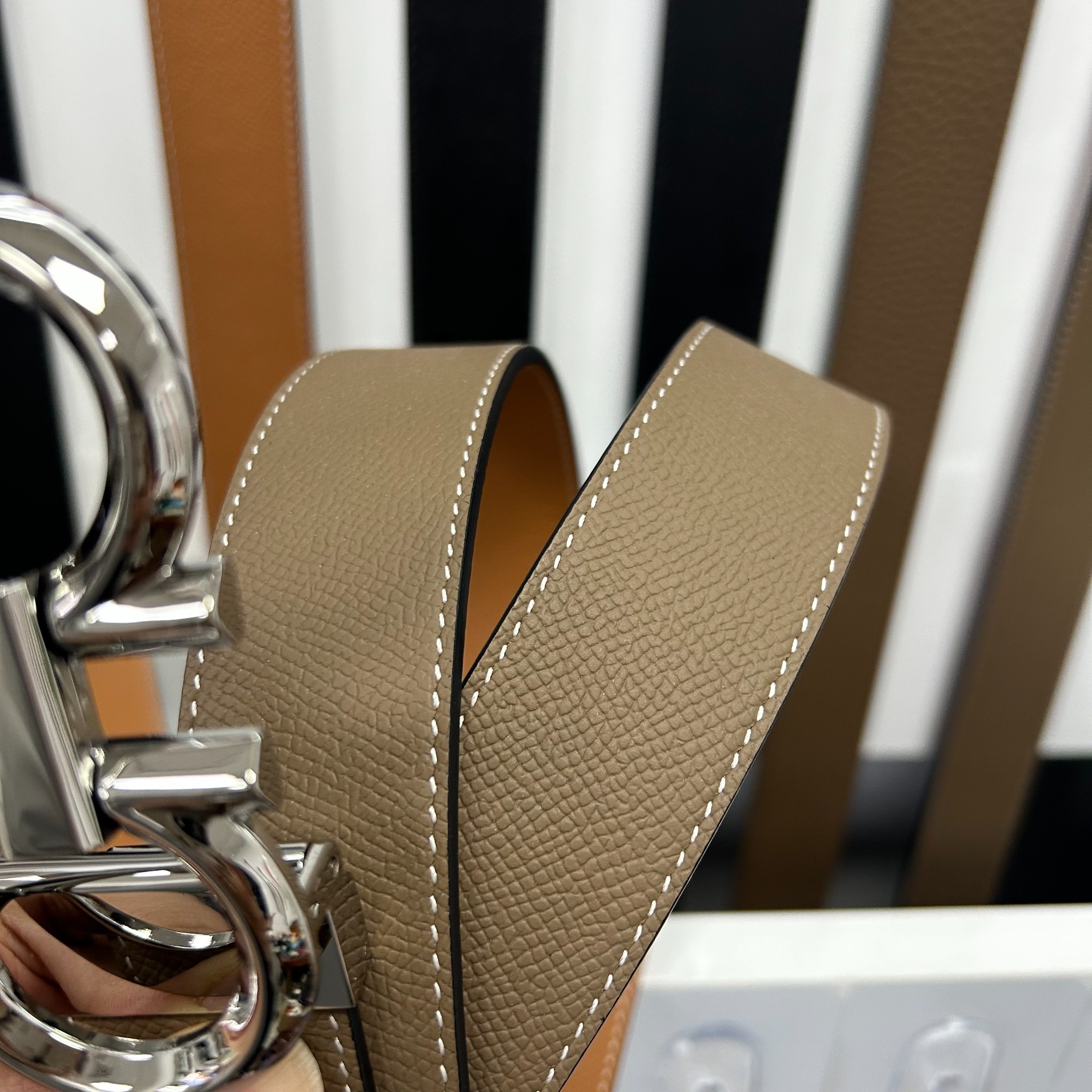 Taupe textured leather belt stitching detail