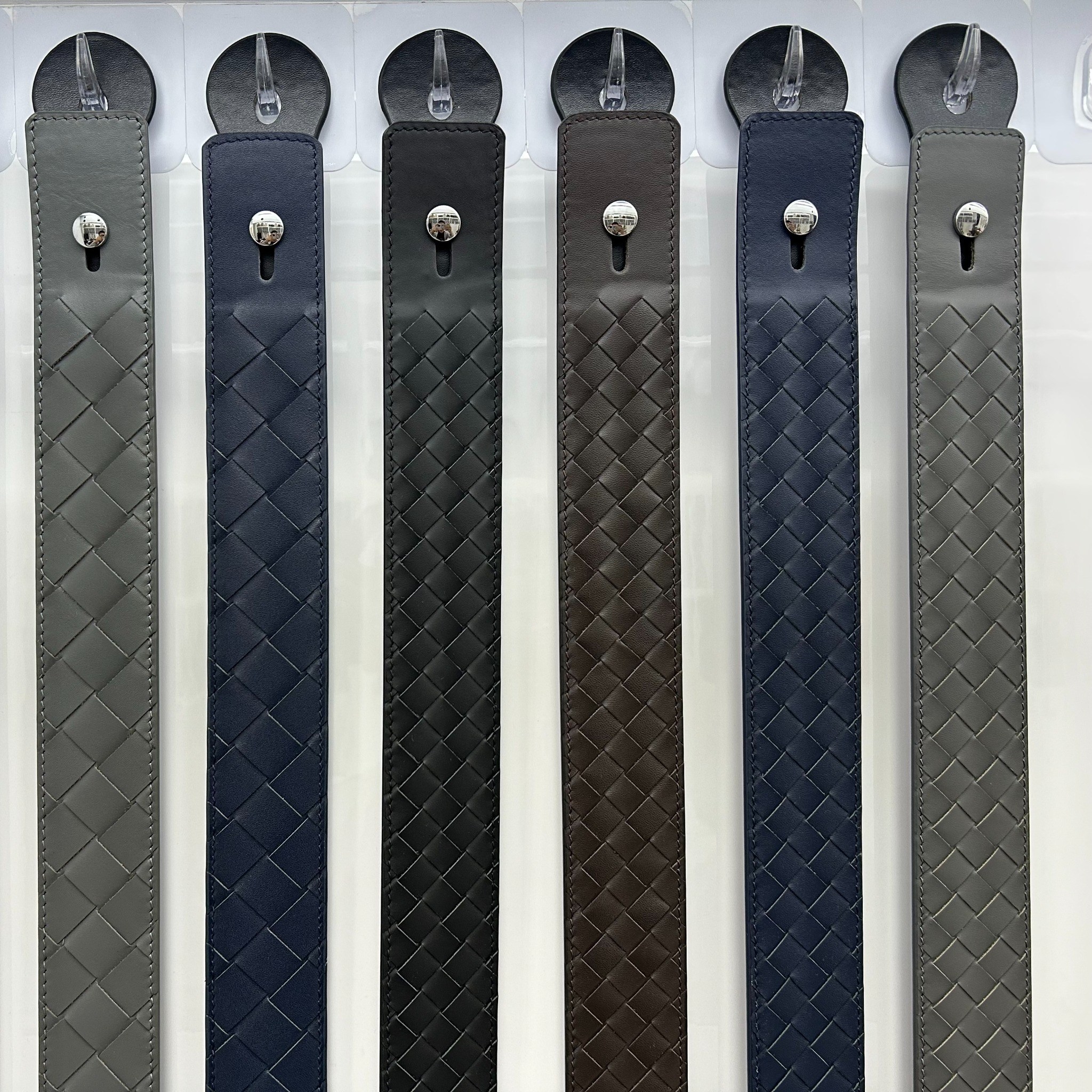 Woven-pattern leather belt straps in multiple colors